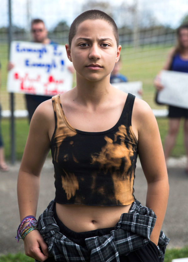 Feb 18, 2018; Parkland, FL, USA; Emma Gonz·lez, 18, a senior at Marjory Stoneman Douglas High School poses for a photo at North Community Park. Gonz·lez became a viral sensation after videos of her impassioned speech at an anti-gun rally in Fort Lauderdale flooded social media. Now, she is helping to lead the #NeverAgain movement with her fellow classmates. "Itís funny. I didnít even have a Twitter account before two hours ago and it was trending on Twitter all day yesterday," Gonz·lez said. "I have become somewhat of a spokesperson for this, but weíre all saying the same thing. That's why we teamed up together like this because we know each other, we love each other very much and we all agree on the same stuff. Weíre happy that all of us are still alive and weíre gonna make sure it stays that way for the people in our neighboring communities. For our neighbors, our cousins, this generation, not the next generation because the next generation will never have to worry about this because of us." Mandatory Credit: Nicole Raucheisen/Naples Daily News via USA TODAY NETWORK/Sipa USA