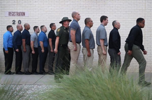 Photos: John Moore / Getty Images A Border Patrol instructor with trainees at the agency’s academy in Artesia, N.M. New agents must complete a months-long training course at the New Mexico facility before assuming their posts