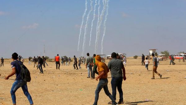 An Israeli drone fires teargas canisters on Palestinian protesters, east of Khan Younis, in the Gaza Strip, Tuesday, May 15, 2018. Israel faced a growing backlash Tuesday and new charges of using excessive force, a day after Israeli troops firing from across a border fence killed 59 Palestinians and wounded more than 2,700 at a mass protest in Gaza. Adel Hana AP Photo