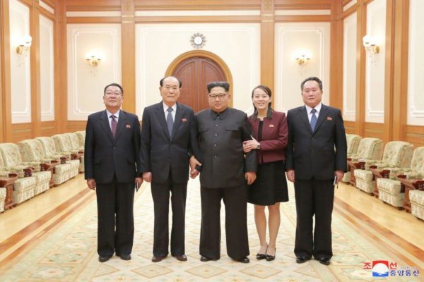 Kim Jong-un with sister Kim Yo-jong, right, and Kim Yong-nam on his left CREDIT: KCNA