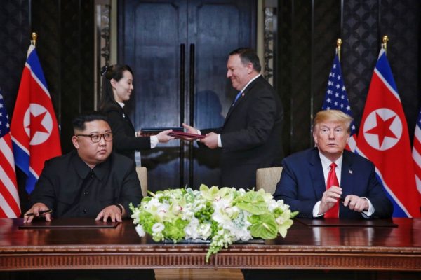 A document being exchanged between US Secretary of State Mike Pompeo and North Korean leader’s sister Kim Yo Jong moments after it was signed. Photograph: Kevin Lim/The Straits Times/EPA