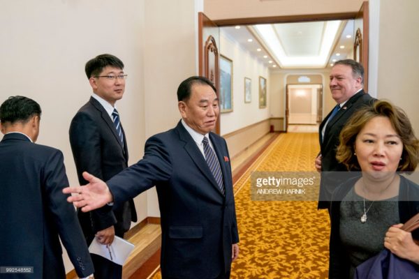 US Secretary of State Mike Pompeo (R), accompanied by North Korea's director of the United Front Department, Kim Yong Chol (3rd L), arrives at the Park Hwa Guest House in Pyongyang on July 6, 2018. - Pompeo arrived in Pyongyang on July 6 to press Kim Jong Un for a more detailed commitment to denuclearisation following the North Korean leader's historic summit with President Donald Trump. (Photo by Andrew Harnik / POOL / AFP) (Photo credit should read ANDREW HARNIK/AFP/Getty Images)