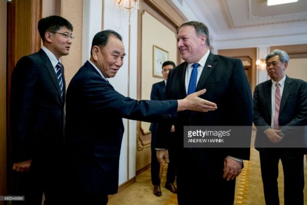 US Secretary of State Mike Pompeo (2nd R) greets North Korea's director of the United Front Department, Kim Yong Chol (2nd L) as they arrive for a meeting at the Park Hwa Guest House in Pyongyang on July 6, 2018. - Pompeo arrived in Pyongyang on July 6 to press Kim Jong Un for a more detailed commitment to denuclearisation following the North Korean leader's historic summit with President Donald Trump. (Photo by Andrew Harnik / POOL / AFP) (Photo credit should read ANDREW HARNIK/AFP/Getty Images)