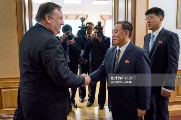 US Secretary of State Mike Pompeo (L) shakes hands with Kim Yong Chol (R), a North Korean senior ruling party official and former intelligence chief, for a second day of talks at the Park Hwa Guest House in Pyongyang on July 7, 2018. - Pompeo arrived in Pyongyang on July 6 to press Kim Jong Un for a more detailed commitment to denuclearisation following the North Korean leader's historic summit with President Donald Trump. (Photo by Andrew Harnik / POOL / AFP) (Photo credit should read ANDREW HARNIK/AFP/Getty Images)