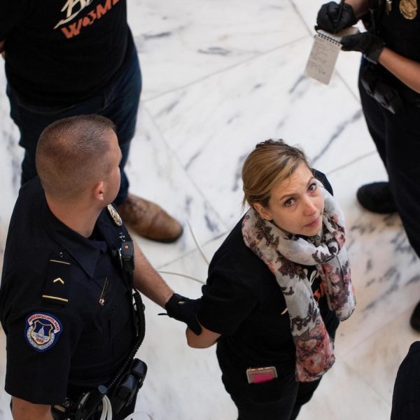 Protesters marched to the offices of Sens. Collins, Sasse and Flake (all of whom are anticipated to be potential swing votes on Judge Brett Kavanaugh's nomination) on Monday, urging the them to vote against Trump's nominee for the Supreme Court. The group, many representing Kavanaugh's alma mater Yale University, also gathered in the rotunda of the Russel Senate Office Building where dozens were arrested and forcibly removed.