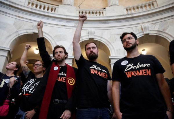 Demonstrators protest in the Rotunda of the Russell Senate Office building on Capitol Hill. 
