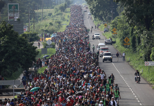 CIUDAD HIDALGO, MEXICO - OCTOBER 21: A migrant caravan, which has grown into the thousands, walks into the interior of Mexico after crossing the Guatemalan border on October 21, 2018 near Ciudad Hidalgo, Mexico The caravan of Central Americans plans to eventually reach the United States. U.S. President Donald Trump has threatened to cancel the recent trade deal with Mexico and withhold aid to Central American countries if the caravan isn't stopped before reaching the U.S. (Photo by John Moore/Getty Images)
