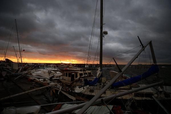 Damaged boats in a marina following Hurricane Michael in Panama City, Fla., Oct. 10, 2018. The National Hurricane Center forecast the storm’s path with great accuracy, but its sudden intensification as it approached land was harder to predict. Millions of residents were caught off guard as Michael escalated from a tropical storm to a major hurricane in just two days, leaving little time for preparations. (Eric Thayer/The New York Times)