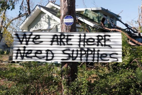 A sign hangs on a tree in front of a house in Panama City, October 13. REUTERS/Terray Sylvester