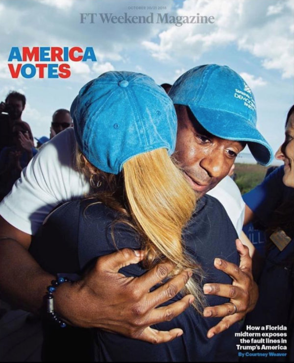 Democratic candidate Andrew Gillum hugs a supporter at a rally in Siesta Key, FL. Photo: Rose Marie Cromwell