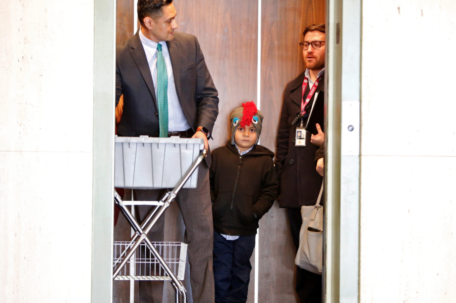 Boy_elevator Reading The Pictures