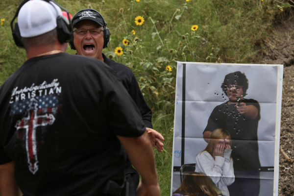 Photo: Lisa Krantz / San Antonio Express News. Caption: Range manager and head instructor Jaime Correa teaches a Principles of Active Shooter class to members of the Safety Response Team made up of congregants at First Baptist Church of Sutherland Springs including Shane Dahlberg, left, at LoneStar Handgun in Converse on June 30, 2018.