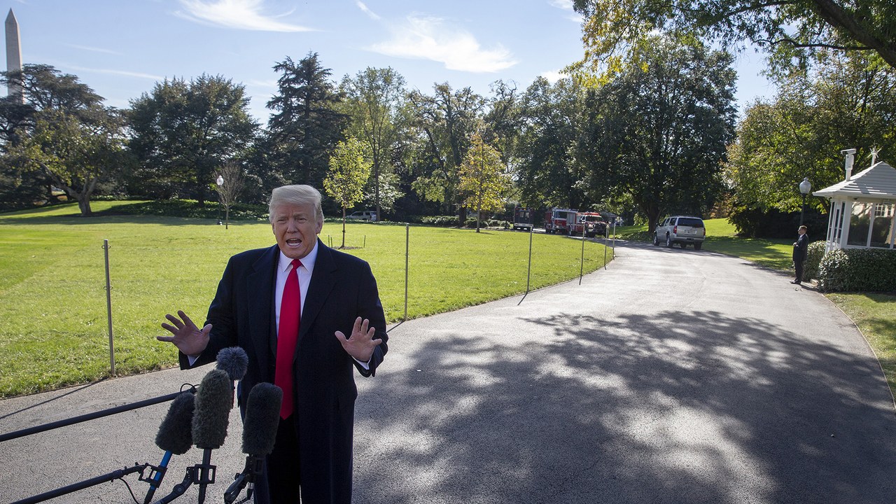 U.S. President Donald Trump speaks to members of the media before boarding Marine One on the South Lawn of the White House in Washington, DC, U.S., on Monday, October 22, 2018. Trump said Congress will vote on a new tax cut for middle-class Americans after the midterm elections, even though Republican lawmakers say they have no such legislation in the works. Photographer: Tasos Katopodis/Bloomberg via Getty Images