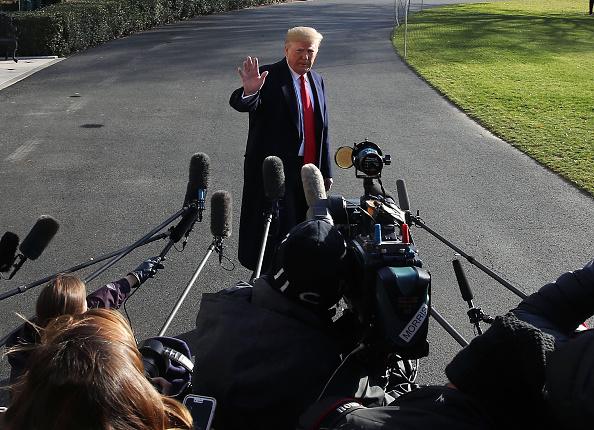 President Donald Trump speaks to reporters before boarding a waiting Marine One on December 7. Trump told reporters he was nominated William Barr to be the next attorney general. Photo: Mark Wilson/Getty