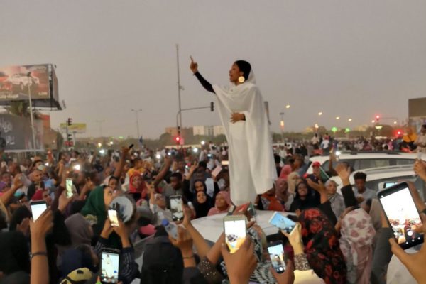 Photo: Lana H. Haroun Caption: This photograph of Alaa Salah's appearance during a protest this week against President Omar al-Bashir of Sudan has swept through social media.
