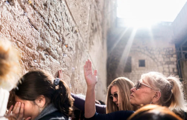 Roseanne Barr, right, stops at the Western Wall in Jerusalem on Jan. 27 during a two-week excursion to Israel. (Melina Mara/The Washington Post)