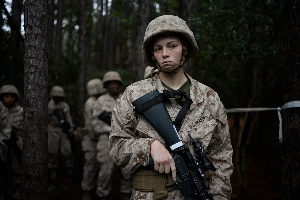 Photo: Lynsey Addario for The New York Times. Danielle Kallmes, 19, pauses at the edge of the woods during the first morning of the Crucible.