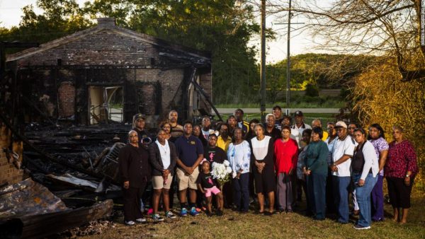 Photo: Edmond Fountain/CNN. Members of the congregation of Greater Union Baptist Church stand for a portrait in front of the ruins of their former church building in Opelousas, Louisiana on April 10, 2019. The church burned on April 2, one of three in St. Landry Parish that burned down in less than two weeks.