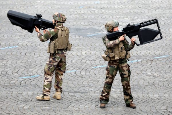 Photo: Charles Platiau/ Reuters French Army soldiers hold anti-drone guns during the traditional Bastille Day military parade on the Champs-Elysees Avenue in Paris. July 14, 2019