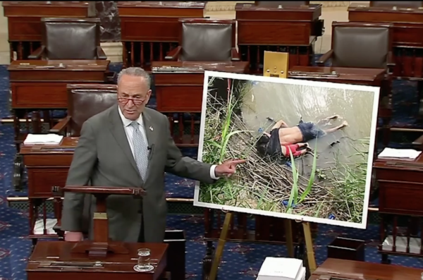 Screenshot Senate Minority Leader Charles Schumer (D-N.Y.) displayed on the Senate floor Wednesday the photo that went viral this week of two drowned migrants in a direct appeal to President Trump over his immigration policies. June 26, 2019