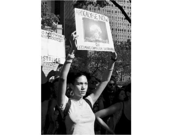 Photo: Jonno Rattman for The New Yorker. Caption: Emilia Goued, seventeen, a student at Manhattan’s Clinton School, holds a sign in Battery Park. From: The Faces of Young Protesters at New York City’s Climate Strike by Doreen St. Félix September 20, 2019.