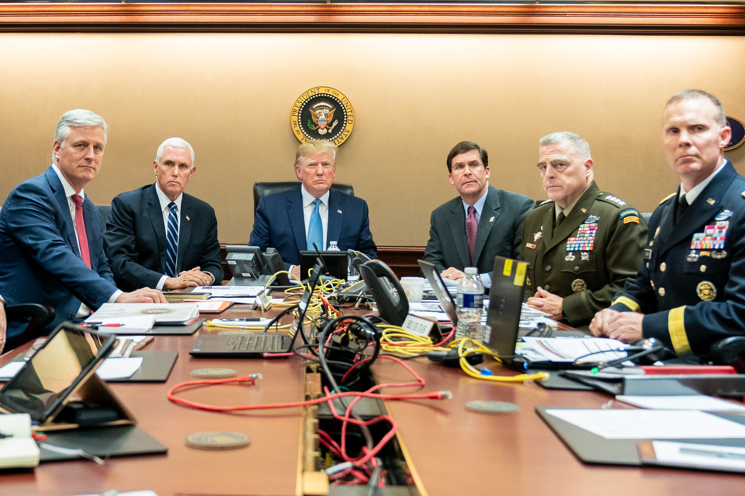 President Donald J. Trump is joined by Vice President Mike Pence, National Security Advisor Robert O’Brien, left; Secretary of Defense Mark Esper and Chairman of the Joint Chiefs of Staff U.S. Army General Mark A. Milley, and Brig. Gen. Marcus Evans, Deputy Director for Special Operations on the Joint Staff, at right, Saturday, Oct. 26, 2019, in the Situation Room of the White House monitoring developments as U.S. Special Operations forces close in on notorious ISIS leader Abu Bakr al-Baghdadi’s compound in Syria with a mission to kill or capture the terrorist. (Official White House Photo by Shealah Craighead) 