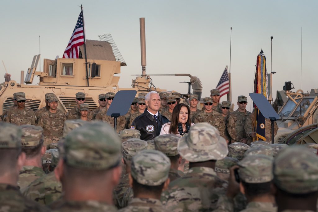 Photo: Andrew Harnik/AP. Caption: Vice President Mike Pence and his wife Karen Pence arrive to speak to troops at Erbil International Airport in Erbil, Iraq, Saturday, Nov. 23, 2019.
