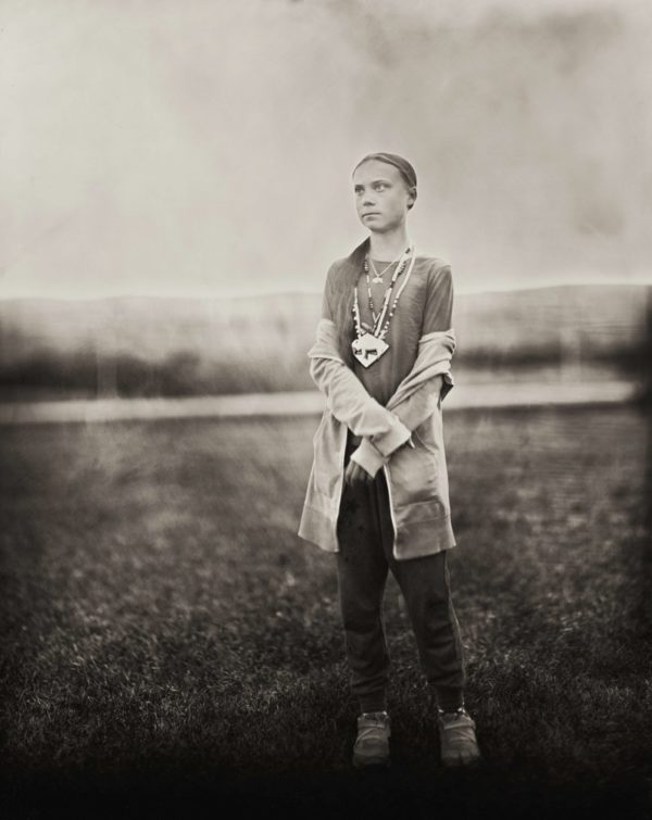 Photo: Shane Balkowitsch via AP. This Oct. 8, 2019 photo provided by Shane Balkowitsch shows climate activist Greta Thunberg visiting the Standing Rock Sioux Reservation in Fort Yates, N.D. Thunberg accepted the photographer's request to pose for the photo using an old technique that involves wetting glass plates with various chemicals before making an exposure. The resulting photographs are being archived at the Library of Congress in Washington and the Swedish History Museum in Stockholm.