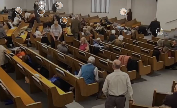 In a video, at least seven parishioners appear to be holding handguns seconds after the shooting in a Texas church.