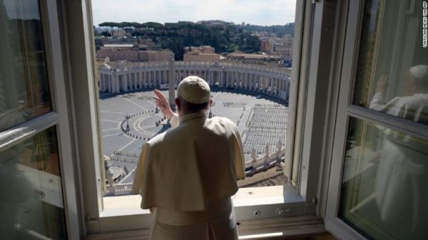Photo: Vatican News via AP Caption: Pope Francis delivers his weekly blessing to an empty St. Peter's Square on Sunday, March 15, 2020.