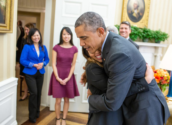 Oct. 24, 2014 "When Nina Pham walked into the Oval Office, the President gave her a big hug as her family and White House Dr. Ronny Jackson watched. Nina, a Dallas nurse diagnosed with Ebola after caring for an infected patient in Texas, was being treated at the National Institutes of Health in nearby Bethesda, Maryland, and the President invited her to the White House when she was released after being declared Ebola-free." (Official White House Photo by Pete Souza)President Barack Obama visits with Nina Pham, a Dallas nurse diagnosed with Ebola after caring for an infected patient in Texas, in the Oval Office, Oct 24, 2014. Pham is virus-free following treatment at the National Institutes of Health Clinical Center in Bethesda, Maryland. Pham is accompanied by HHS Secretary Burwell, Pham's mother Diana Pham, sister Catherine Pham, Dr. Anthony Fauci, Director of The National Institute of Allergy and Infectious Diseases, Pham's primary doctor Dr. Richard Davey, Jr., Dr. Cliff Lane of NIH and Dr. Ronny Jackson, White House Medical Unit. (Official White House Photo by Pete Souza)