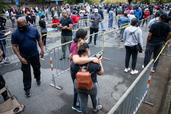 Photo: STEVE SCHAEFER / SPECIAL TO THE AJC Long lines form outside the Cobb County Board of Elections and Registration offices for the first day of early voting Monday Morning, October 12, 2020.
