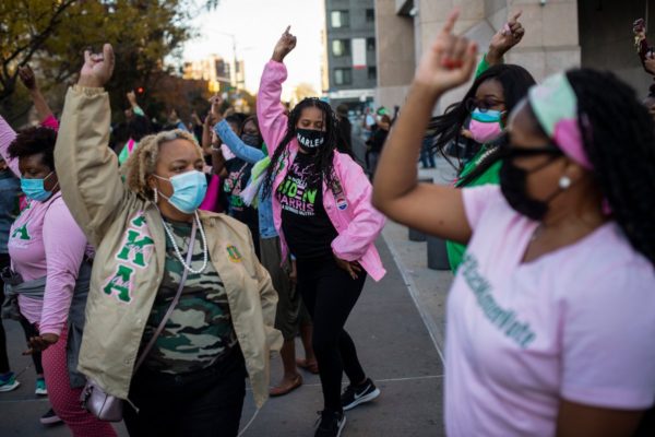 Photo: Gregg Vigliotti for The New York Times Members of the Alpha Kappa Alpha sorority gathered in Harlem on 125th Street to celebrate.