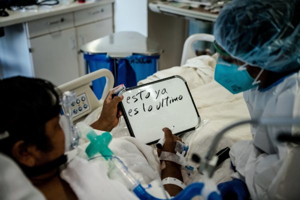 Photo Meridith Kohut for The New York Times A Covid-19 patient in Los Angeles County asking, Is this the end? A few hours later, doctors intubated the patient.