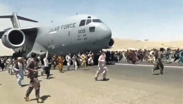 US Transport Plane Swarmed By Afghans on a Kabul Runway