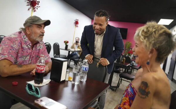 Romane Pierre of Rose Goute Creole Restaurant in Springfield, Ohio, helps a line of customers, Monday, Sept. 16, 2024. Photo: Jessie Wardarski/AP